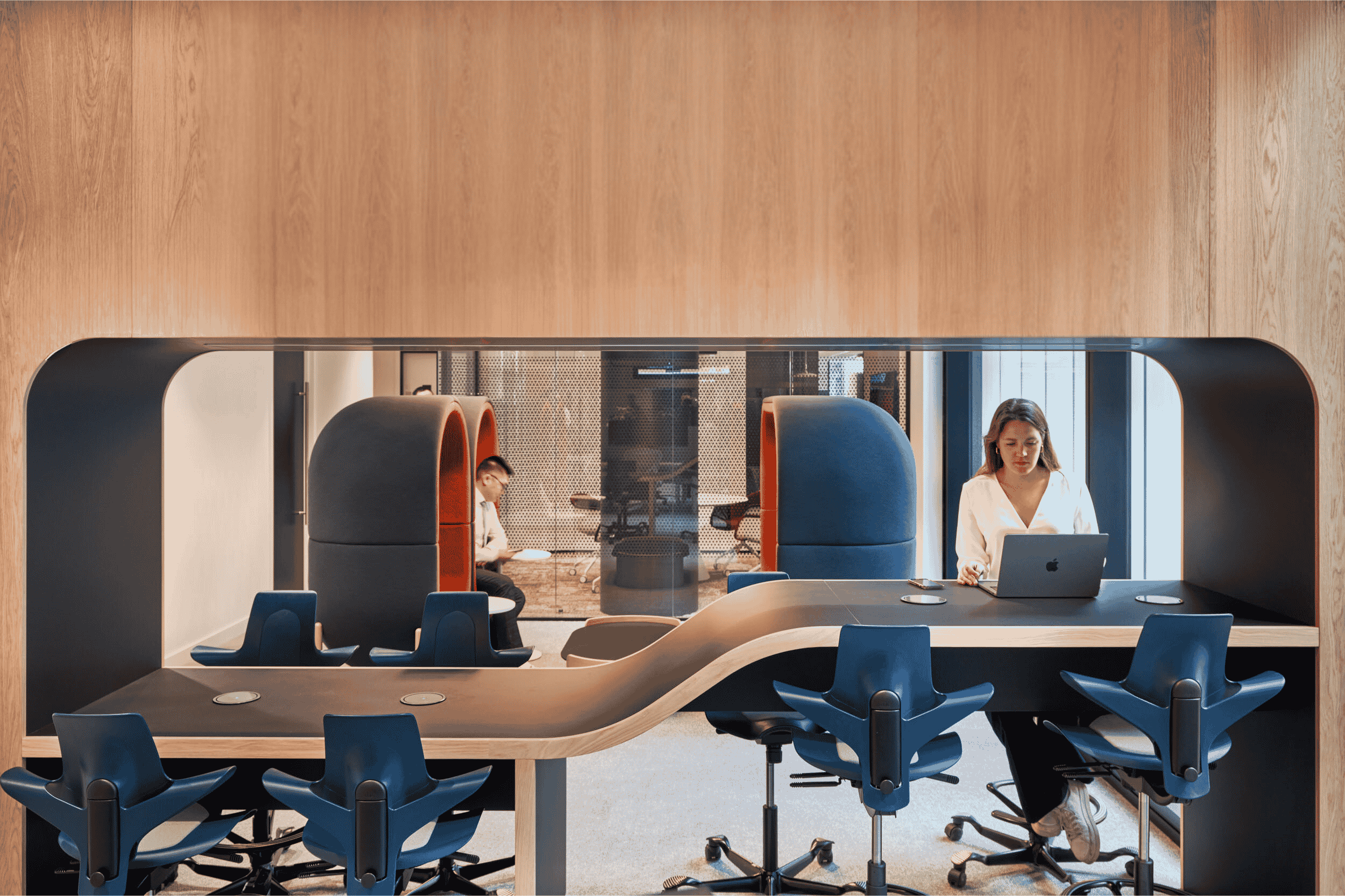 The Top Tech Destinations To Watch This Year Capital.com pods with employees using the space.