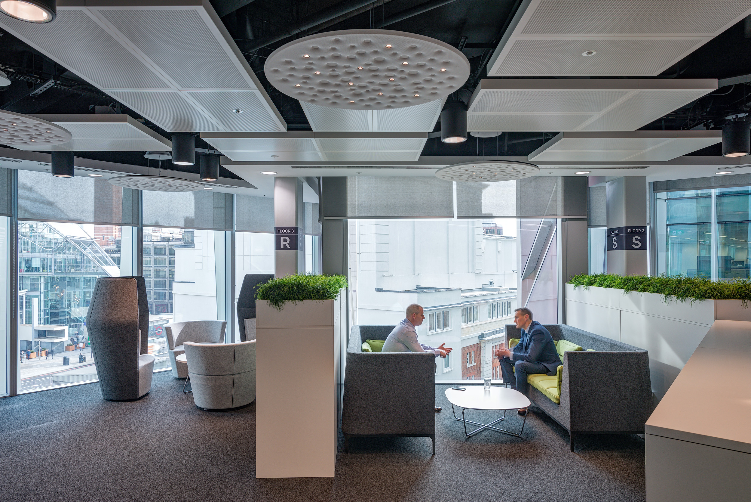 A bright and open breakout area in Atkins' Nova North office overlooking the surrounding Victoria neighbourhood.