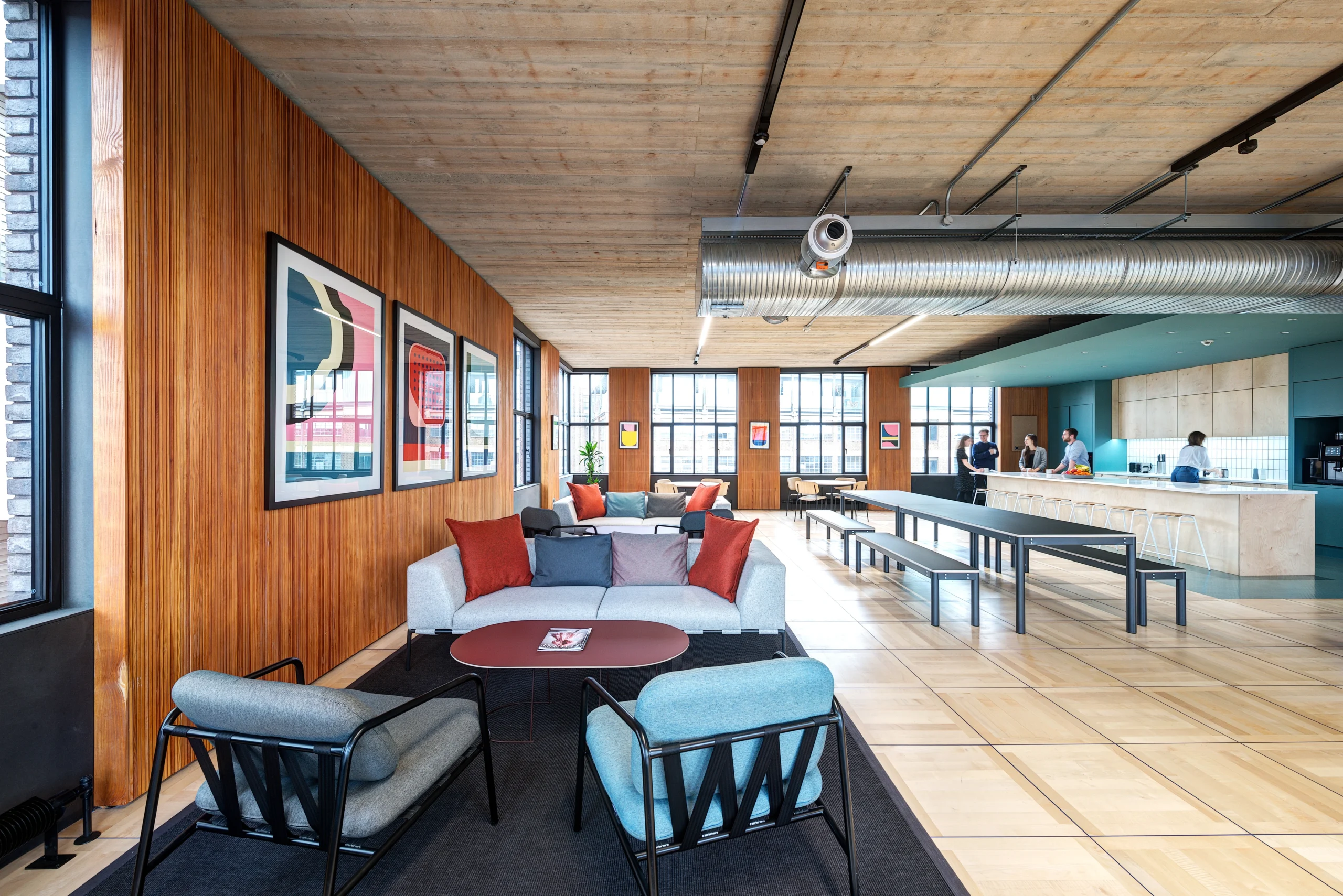 Joseph Joseph open plan workspace close to the teapoint with soft seating, hard seating and stools at the teapoint.