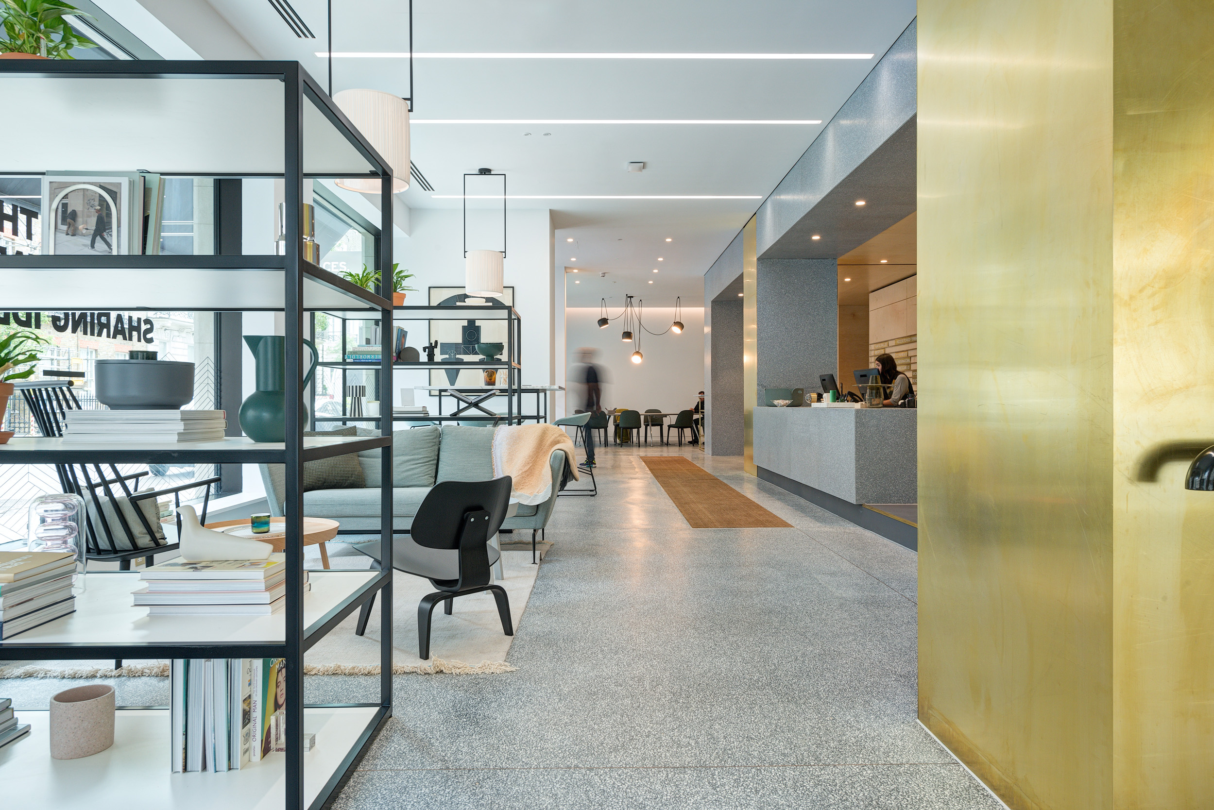 Breakout area with contemporary furniture and shelving at Spaces Harley Building in Fitzrovia.