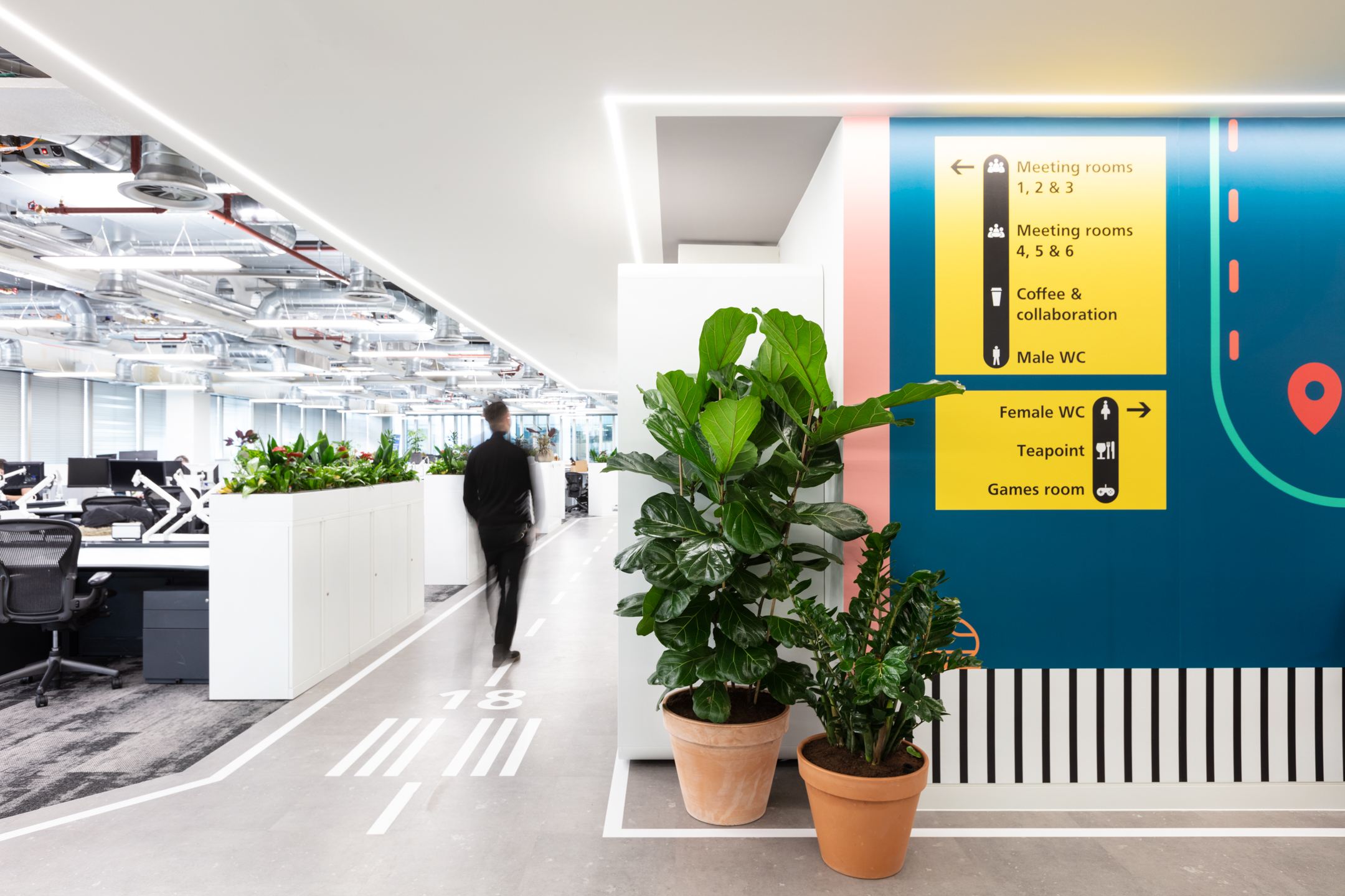 Travelfusion bespoke designs featured on the walls and floor, replicating a runway at an airport.