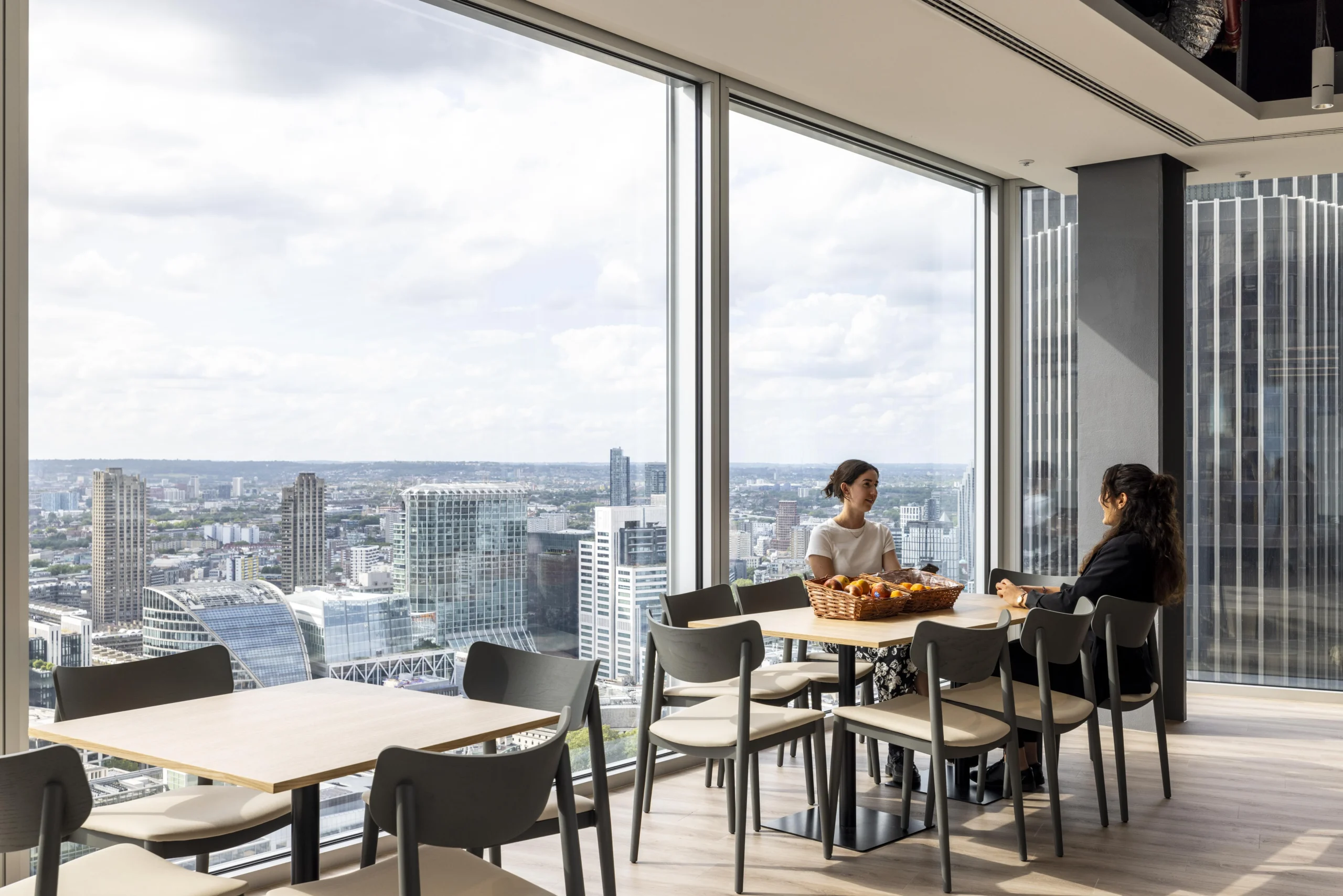 Investment Company skyline view featuring a collaborative area and open area.