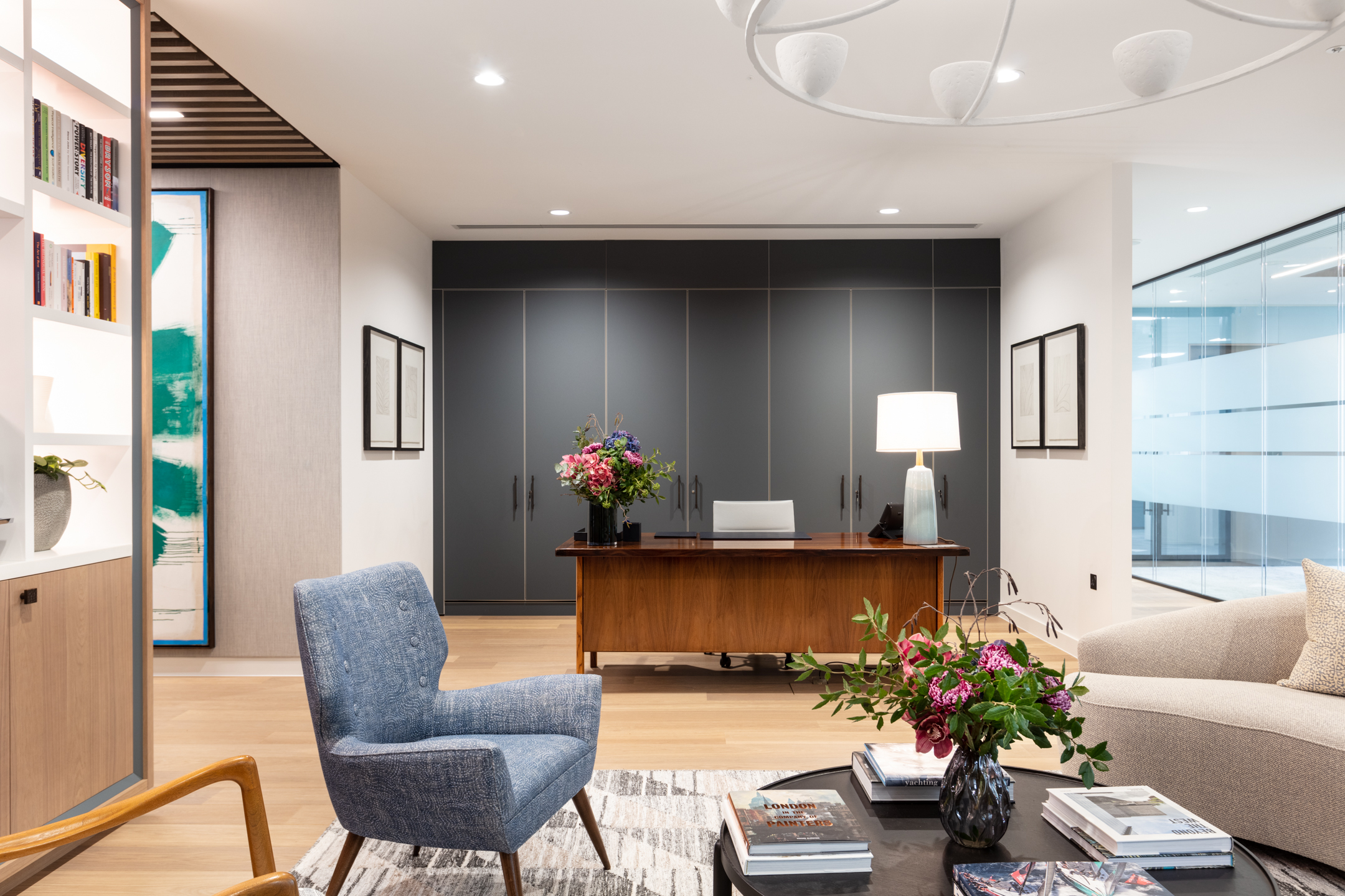 Modus Workspace designed reception for Asset Management Firm Floor 3, indulging in luxurious furniture and bespoke lighting