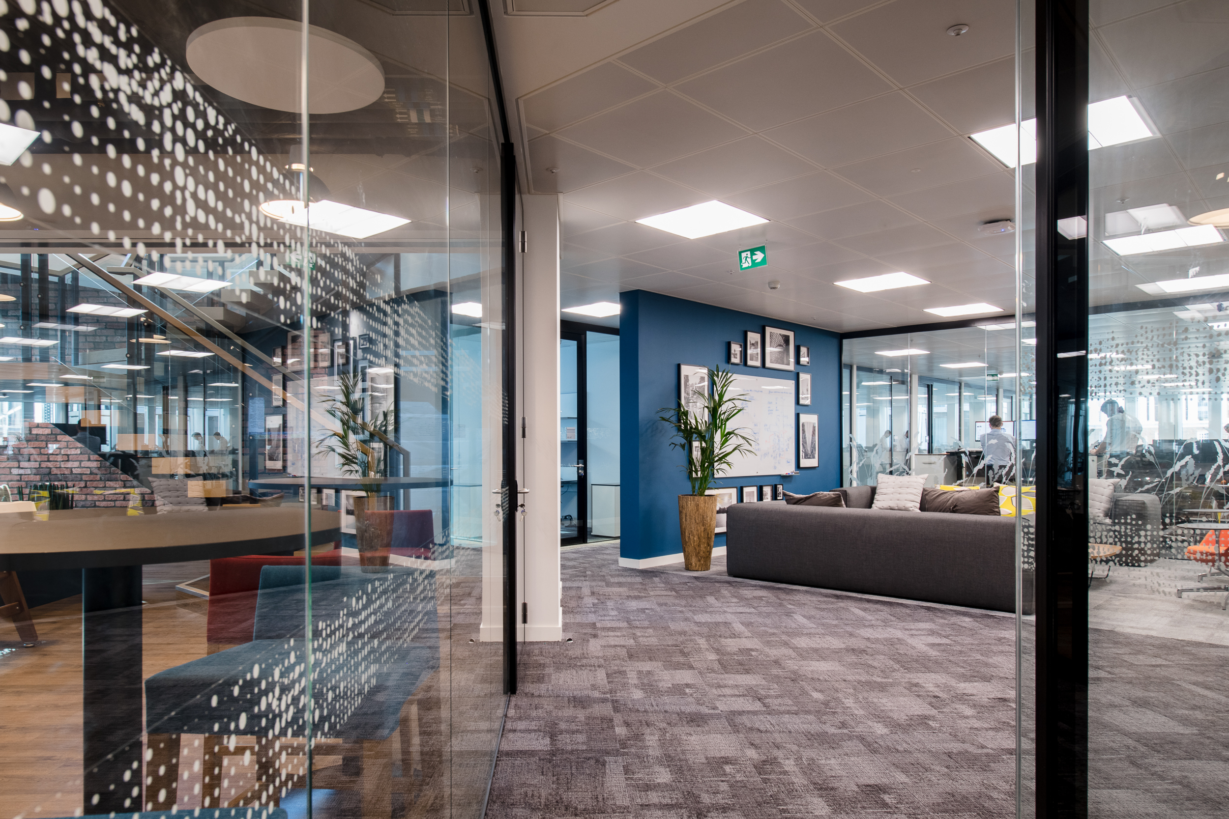 CRA Open plan view of the office at Charles River Associates, featuring a modern workspace layout by Modus Workspace.