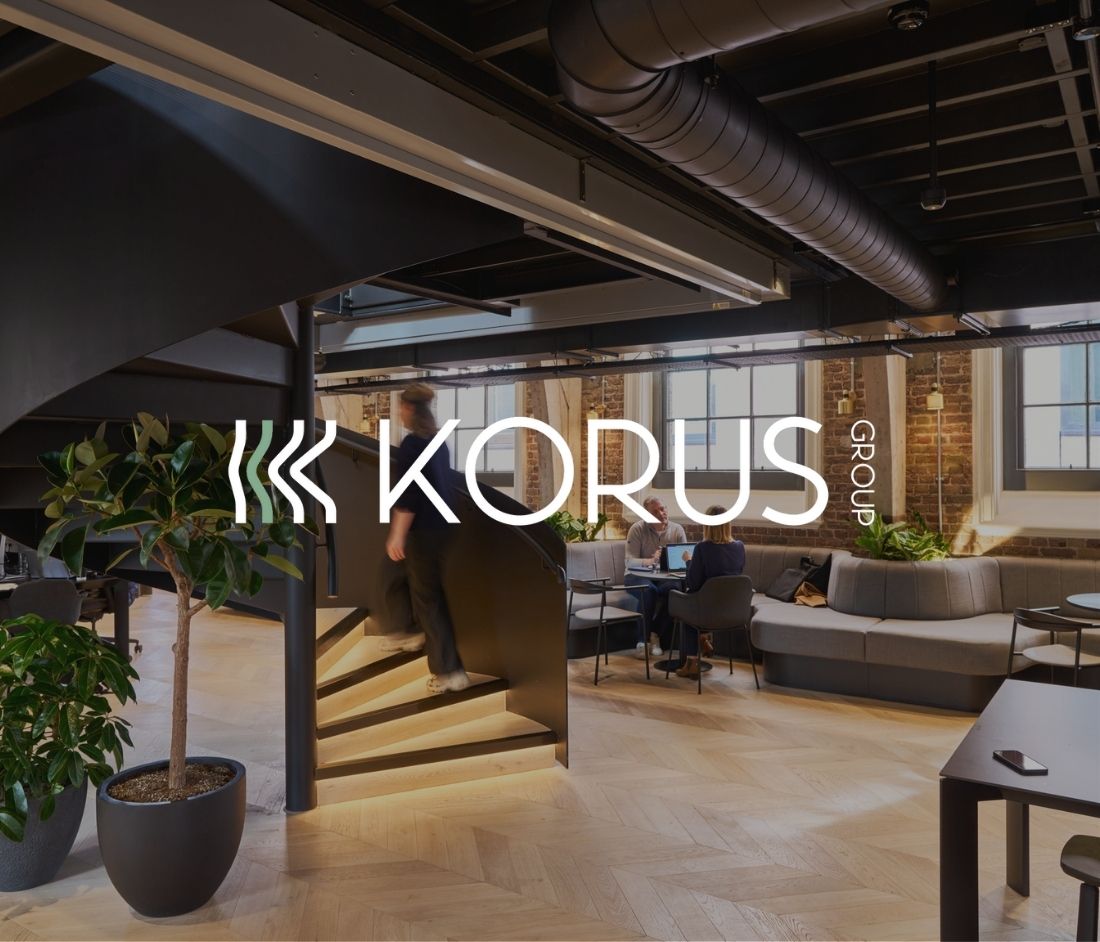 Korus' logo superimposed on an image of a cutting-edge workspace.