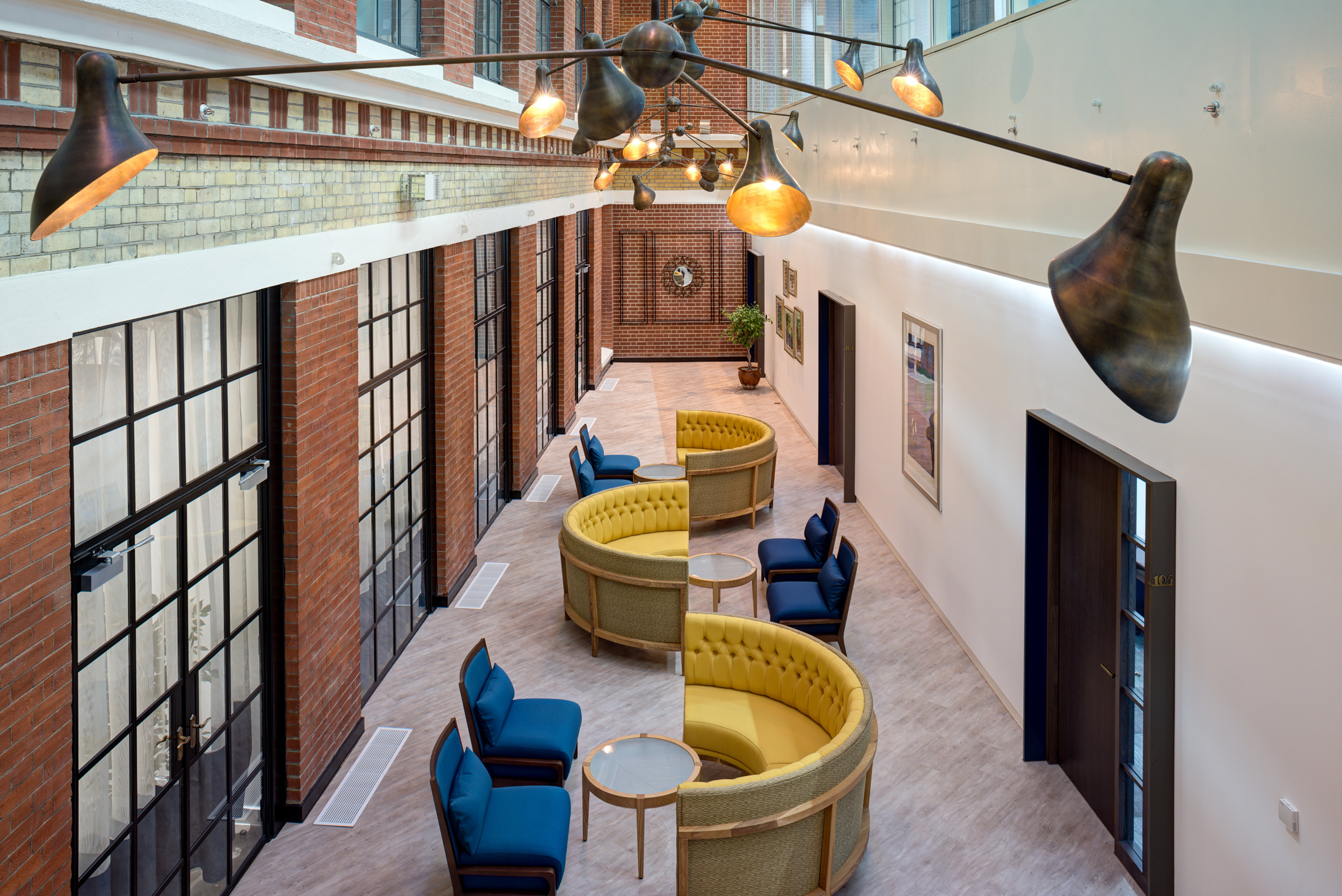 Atrium seating area at Michelin House, featuring a mix of heritage architecture and contemporary design for LEO.