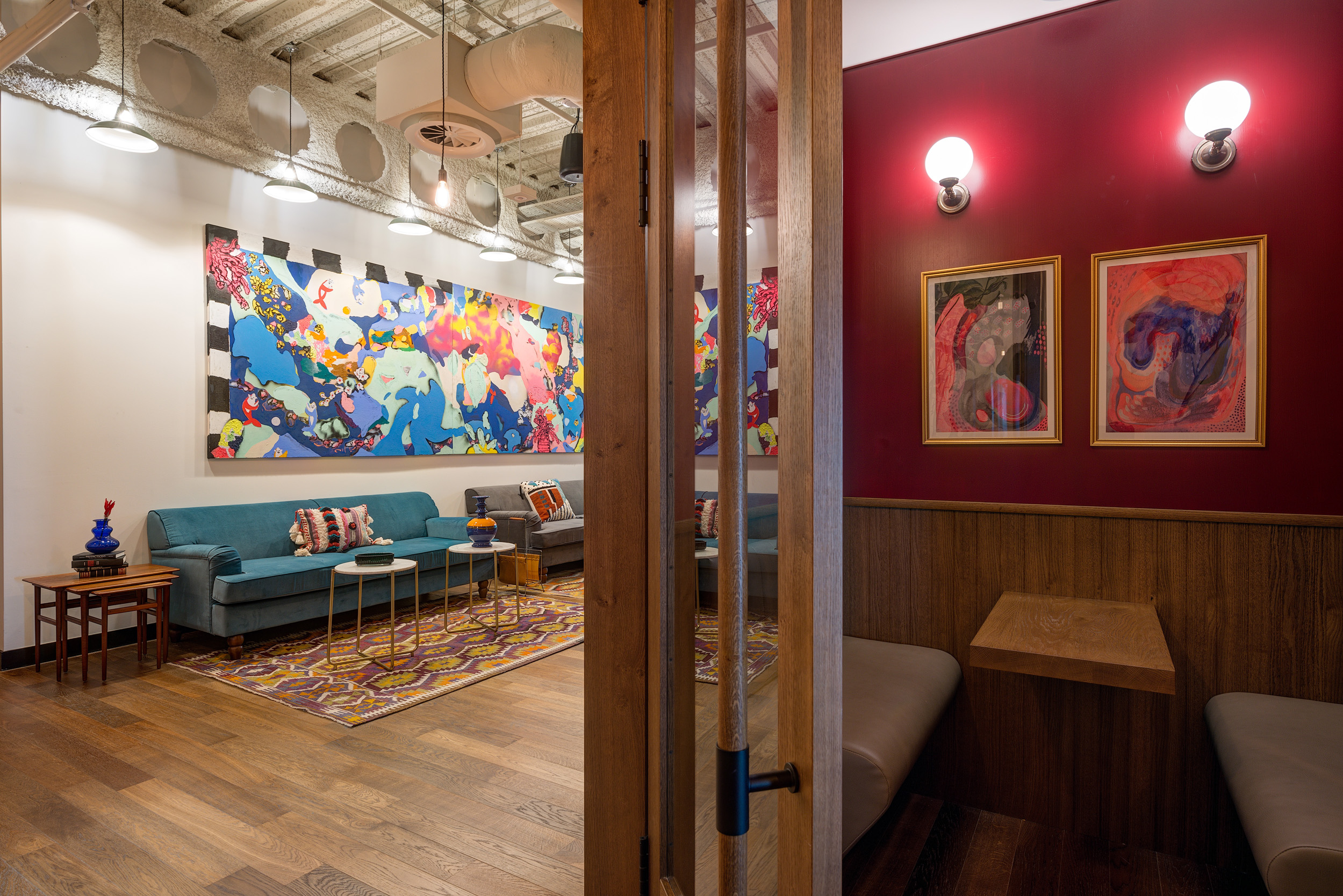 Mindspace Appold Street's vibrant seating area with colourful artwork and lighting.