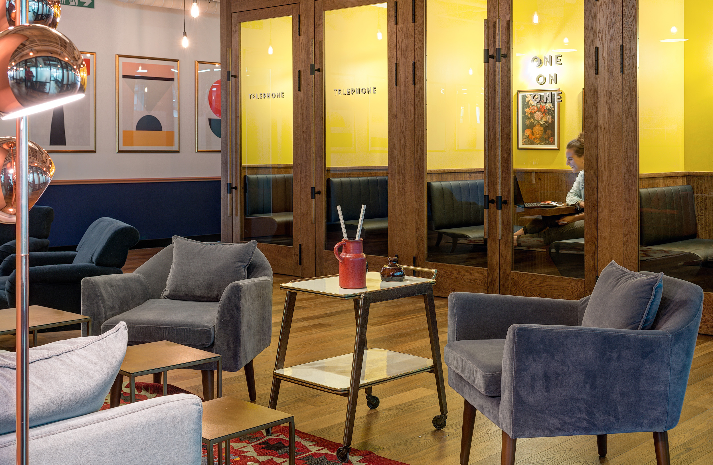 Mindspace Appold Street's Lounge area with chairs and quiet pods designed by Modus Workspace.