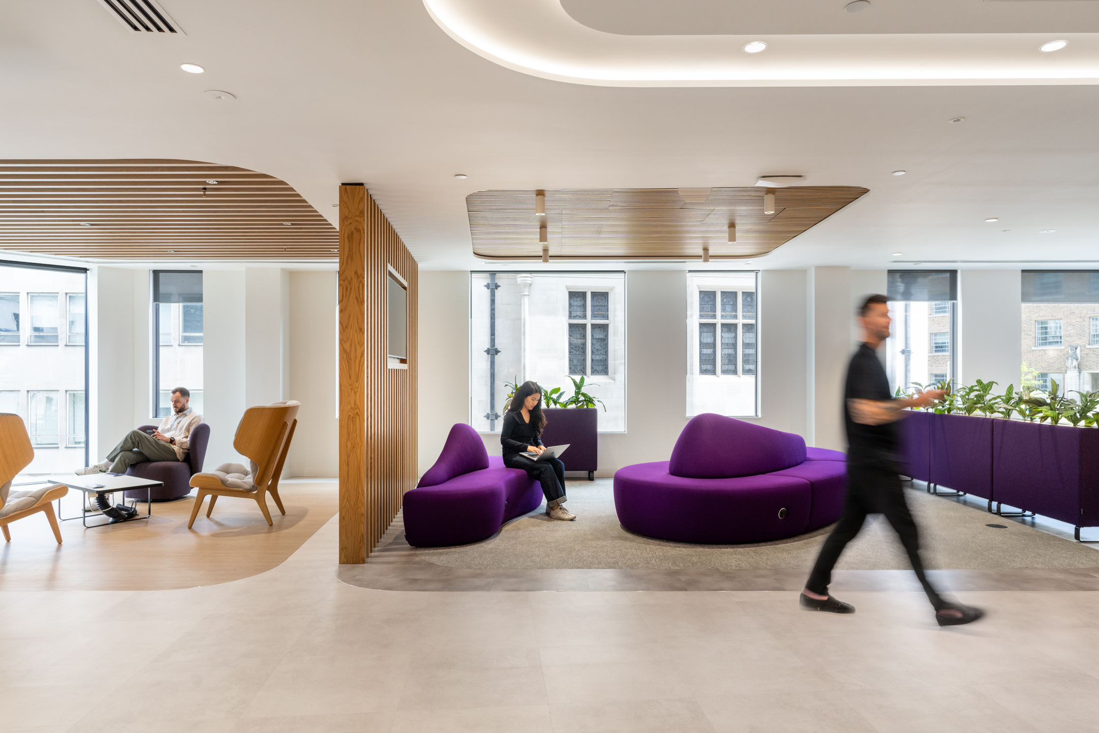 DXC Technology bespoke branded coloured purple seating area, designed by Modus