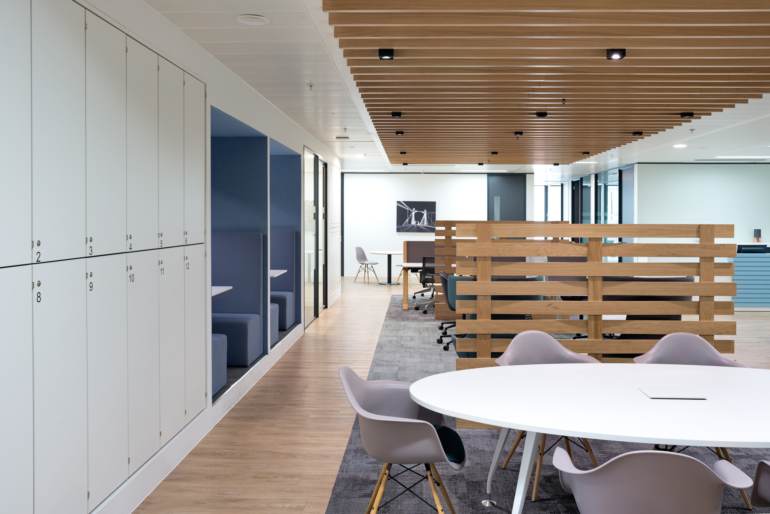 Breakout desking space and lockers in Regus’s St Mary Axe coworking office.