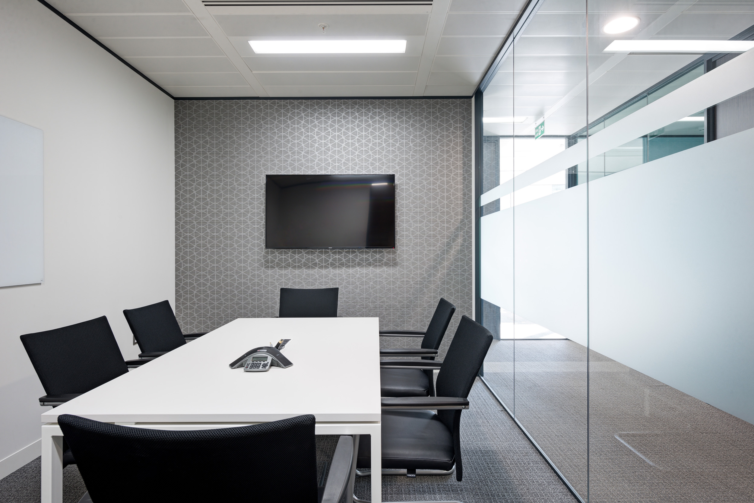 Contemporary meeting room with glass partitions at Regus St Mary Axe, designed for privacy and collaboration.