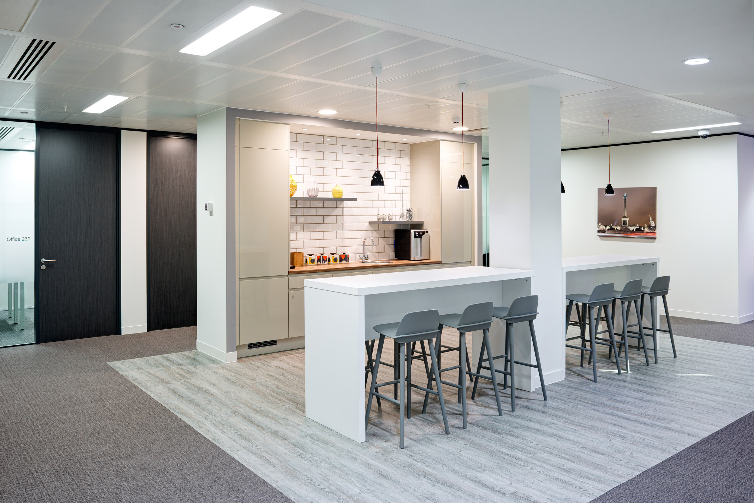 Teapoint area at Regus St Mary Axe, designed to create an inviting social space within the flexible office layout.