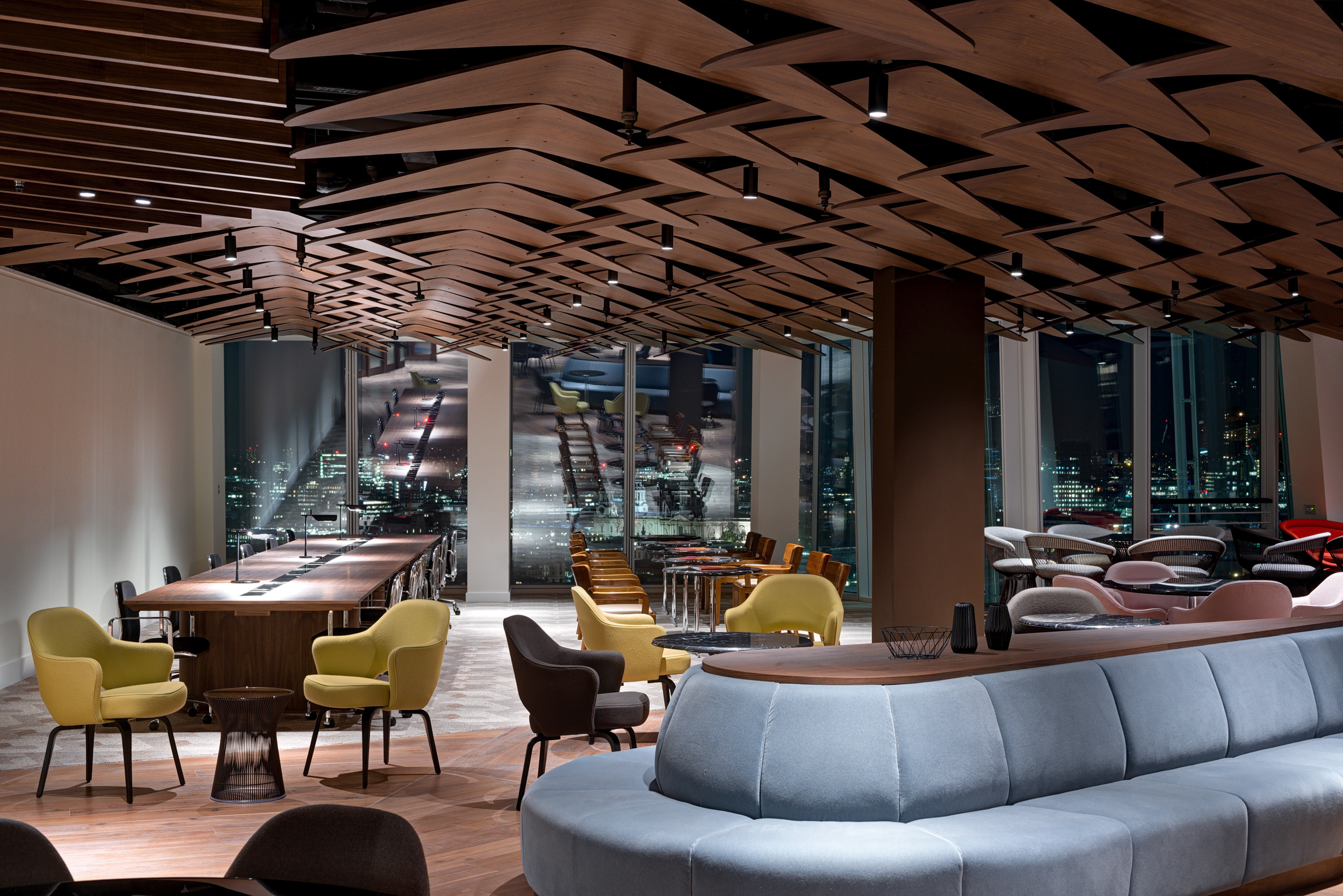 Collaborative workspace with bespoke timber ceiling and views over London, designed for The Office Group at The Shard.