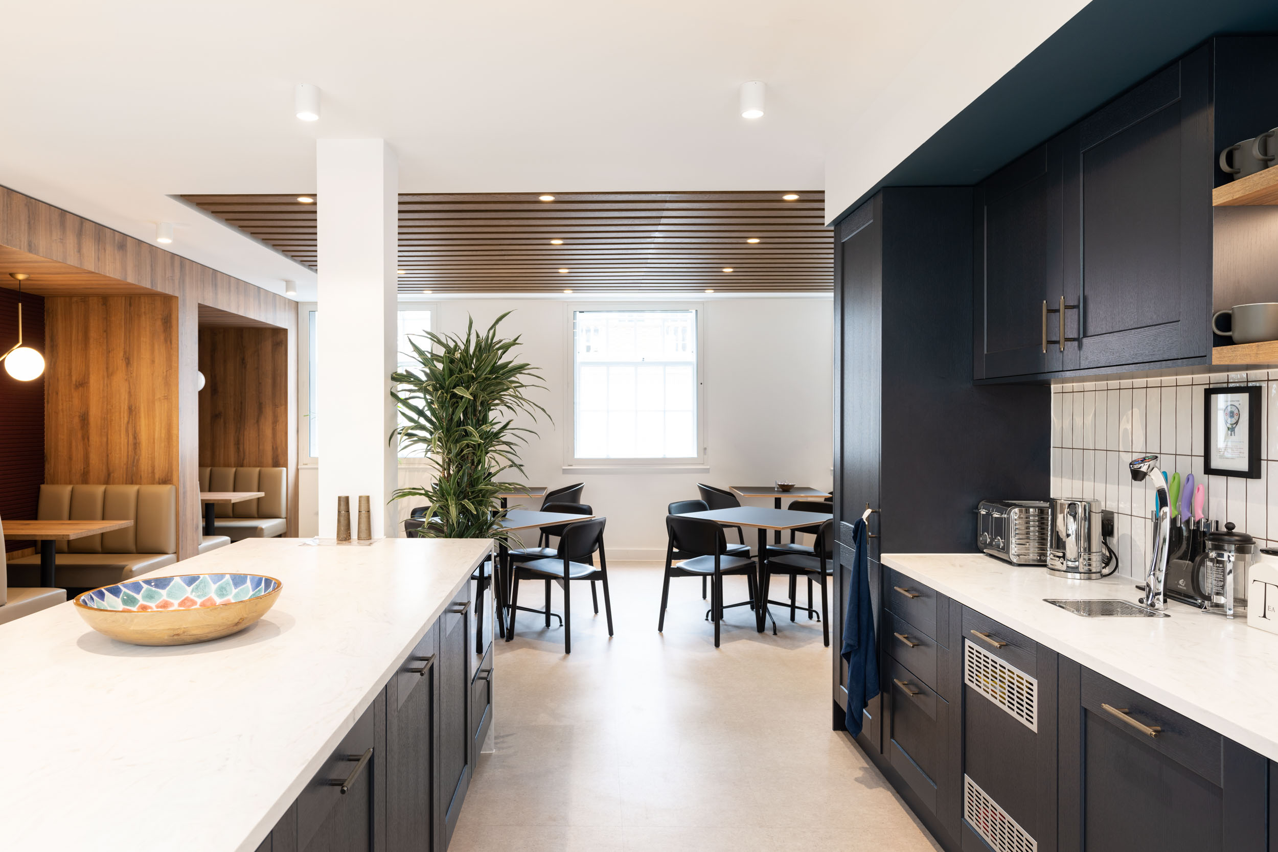 The teapoint area at Weatherbys, with a light, airy feel created by natural finishes and soft lighting.