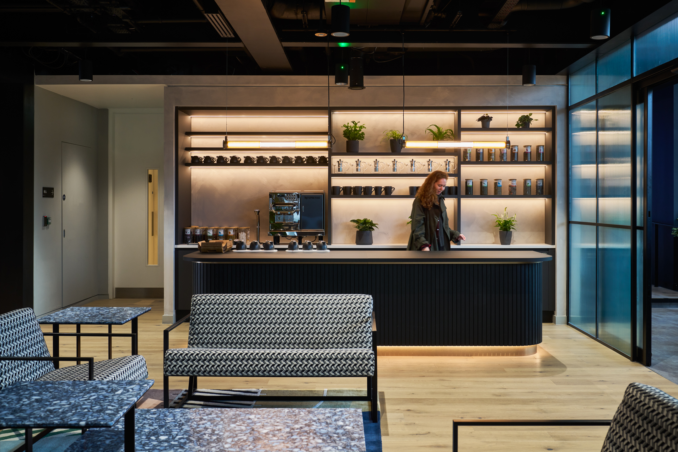 Entertainment Company teapoint featuring a team member making a coffee.